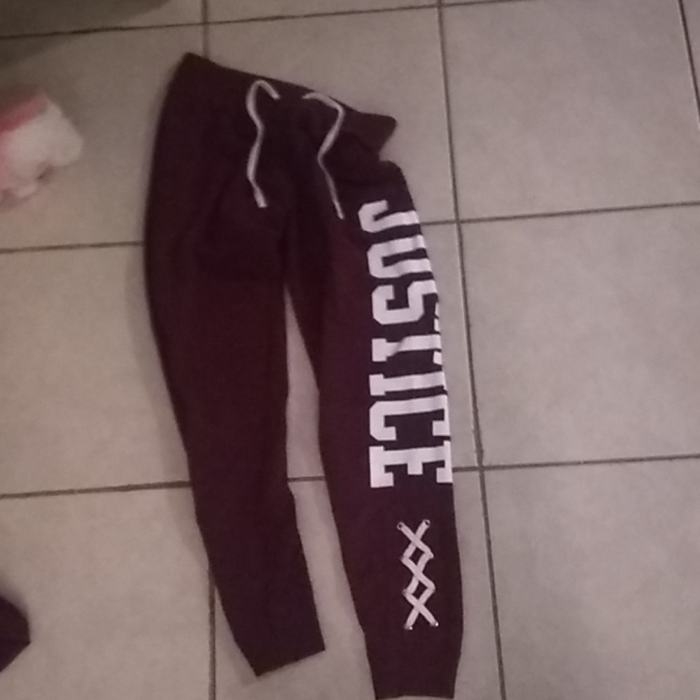 Burgundy tights/sweatpants.